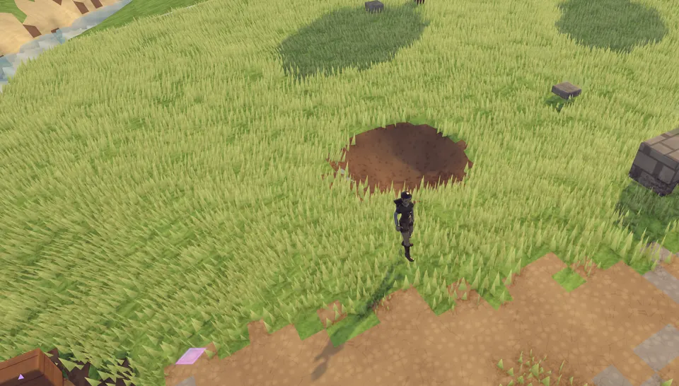A player stands beside a round crater blown into a sunlit meadow, raw earth showing through the grass.